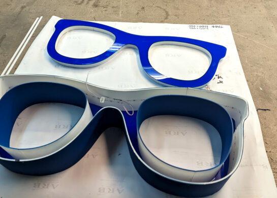 Изготовление вывески очки фото